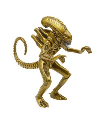 This 3.75” Aliens ReAction figure features a striking gold color